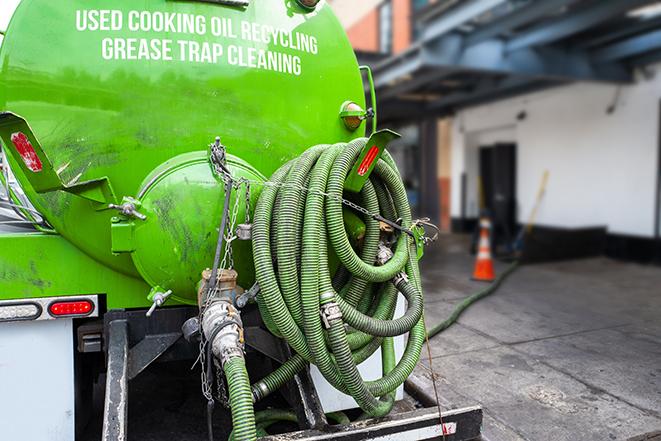 industrial pump clearing a grease trap in Bayville NJ